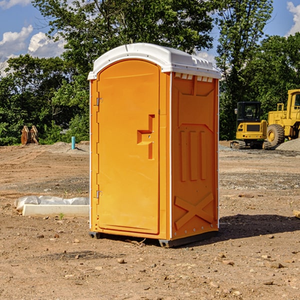 how often are the porta potties cleaned and serviced during a rental period in Grafton